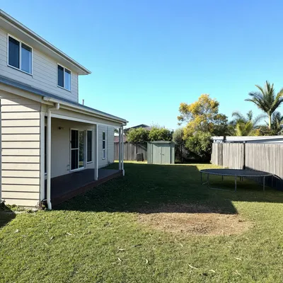 After: Poinciana over a pool, full sectional take-down, Cairns